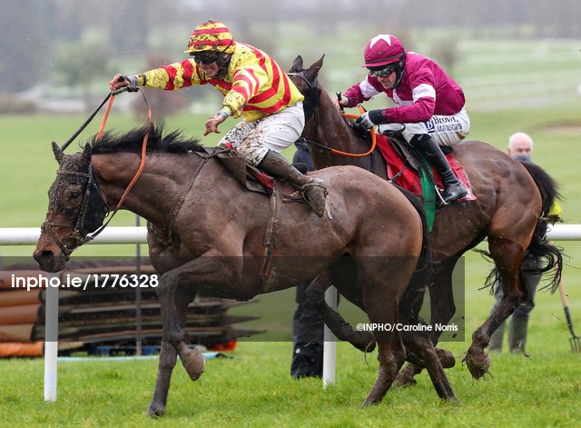 The John Mulhern Galmoy Hurdle Phillip Enright onboard Sams Profile jumps the last to win  ahead of Sean Flanagan onboard Diol Ker 